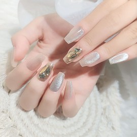 Fresh ice blue nail art with luxurious cat eye stone, finished nail tip with stone