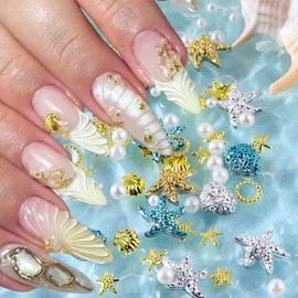 100Pcs Summer Ocean Nail Charms Resin Star Shells Nail Gems and Charms Gold Silver Starfish Nail Rhinestones Pearl Nail Jewels Flat Back Beach Nail Art Rhinestones for Women Nail Crafts Decor
