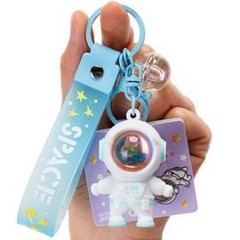 YOU WIZV Kawaii Keychain, Cute Astronaut Anime Cool Keychains for Backpacks, Cartoon Keychains with Sunset Light for Women Men Boys Girls(White)