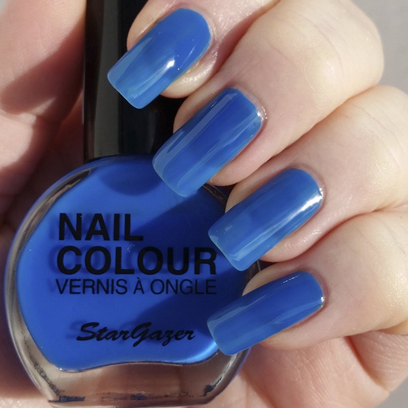 Neon Blue UV reactive nail polish. Bright nail polish that