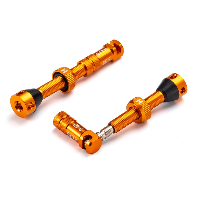 Bicycle Presta Valve Caps Orange with Integrated Spoke Removal Function