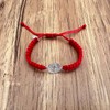 Pulsera de San Benito de Plata ley 925, roja tejida