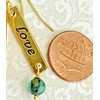 Gold and Green Love Dangle Earrings. Jewelry Earrings for Women