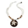Avalaya Brown/Cream Coconut Shell Round Pendant with White Glass Bead