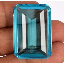 REAL-GEMS Swiss Blue Topaz 108.05 Ct Brazilian Topaz Faceted Emerald Cut Loose Stone