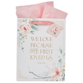 Christian Art Gifts Large Portrait Inspirational Scripture Gift Bag, Tag & Wrapping Tissue Paper Set for Women: He First Loved Us & Love is Patient Bible Verses, Wedding White & Pink Floral w/Gold