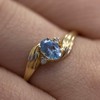 10k Yellow Gold Oval Blue Topaz And Diamond Ring (Size