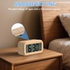 GUUMUXIN Digital Alarm Clock with Temperature Display and Brightness Sensor.