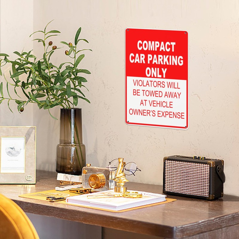 Compact Car Parking Only Violators Will Be Towed at Owner's