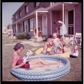 HistoricalFindings Photo: Woman,Relax,Inflatable Children's Swimming Pool,Children Play,IL,Illinois,1954