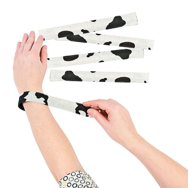 Fun Express - Cow Print Slap Bracelet for Party - Jewelry - Bracelets - Slap Bracelets - Party - 12 Pieces White