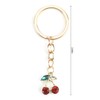 MUCOOS Small cherry key ring, decorated with delicate small rhinestones,