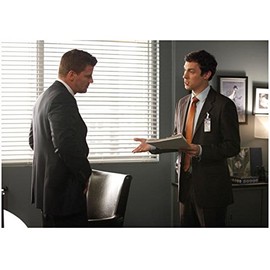 Bones David Boreanaz as Agent Booth Standing Wearing Suit Hands on Hips and John Francis Daley as Dr. Sweets Holding Papers Talking 8 x 10 Photo