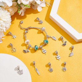 UNICRAFTALE 60Pcs 10 Styles Wholesale Bulk Lots Jewelry Making Antique Silver Charms Bulk Metal Pendants Daisy Flower Leaf Butterfly Charms for DIY Necklace Bracelet Making Hole 4.5mm