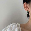 Divertidos aretes de dinosaurio con diseño de dinosaurio verde con