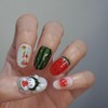 Handmade nail tip for a bear missing a watermelon in