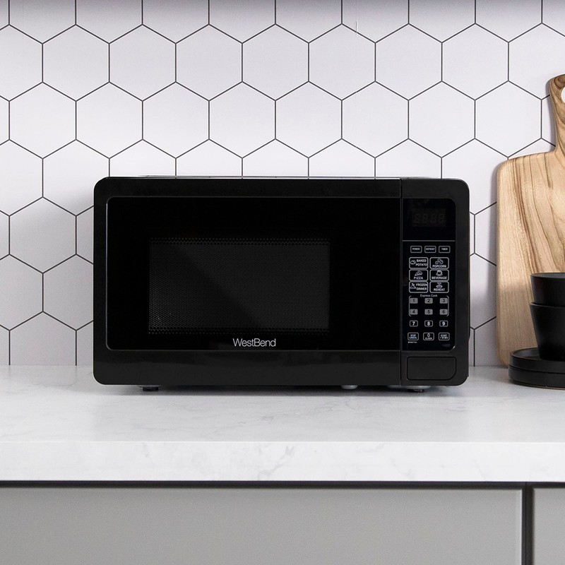 West Bend WBMW71B Microwave Oven 700-Watts Compact with 6 Pre