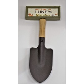 "Welcome to Luke's garden" hanging shovel sign