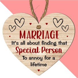 Humorous Marriage Plaque – "Marriage: It’s All About Finding That Special Person to Annoy for a Lifetime" – Quirky Heart-Shaped Wooden Wall Sign – MDF Home Décor Gift for Couples or Newlyweds