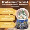 Snow globe Christmas music box, winter hut, base Christmas market