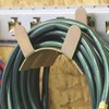 Hose and Cord Holder for X-Track/E-Track Systems