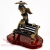 Solid Brass Amber Figurine of City Angel on bench with
