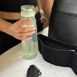 Kichna The Quencher Sports Water Bottle BPA Free Plastic Leakproof Drinking Bottle with Carry-on Loop and Flip Lid for Gym, Hiking, Yoga and Travel 700ml - Pistachio Green