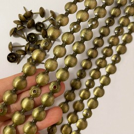 Let's Decorate 5 Meters Upholstery Tacks Strips Brass,Decorative Nail Strips Sofa Trims Tapes,Indoor Garden Chair Tacks,Loosing Tacks Matched (11mm Brass)