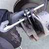 Dedicated tool for pushing the caliper piston back easily when