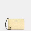 Coach NWT Coach CAQ75 Corner Zip Wristlet In Signature Canvas