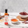Aceite de ajonjolí picante Inés. Con chile de arbol y