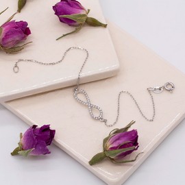 Tuscany Silver Women's Sterling Silver Rhodium Plated CZ 24mm x 6mm 'Infinity' Bracelet 18.5cm/7.25'