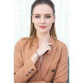 B. BRILLIANT Yellow Gold Flashed Sterling Silver Created Blue Sapphire 4mm Round-Cut S Design Tennis Bracelet with White Topaz Accents