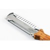 3-in-1 Kitchen Peeler, Scrabber & Grater: a cutting tool with