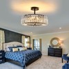 DAFKOS 4 Lights Modern Crystal Chandelier Black Round Semi Flush