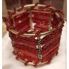 Set mit 4 roten Serviettenringen aus Metall und Perlen