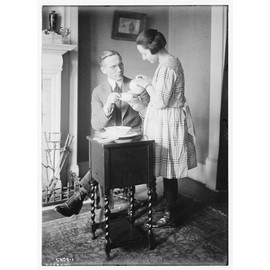 HistoricalFindings Photo: Johnson,Men,Women,Drinking Tea,Tables,Dishes,Bowls,Saucers,Plants,Pouring,Suits