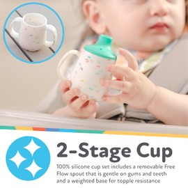 Nuby First Training Cup - Silicone Cup with Free-Flow Spout and Easy-Grip Design - 2 oz - 6+ Months - Coral and Sprinkles