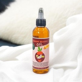 Christ Beauty Oil Christ Beauty Oil with carrots, rosemary, ginger, extra virgin olive oil, avocado, aloe, cloves, coconut, and mint for growing and nourishing hair