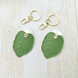Paquete de 2 fundas de piel para llavero Airtag, accesorios Kawaii adecuados para Airtag (hojas verdes)