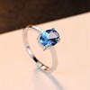 Bellitia Jewelry Blue Topaz Oval Cut Engagement Ring in 925