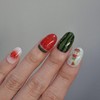 Handmade nail tip for a bear missing a watermelon in
