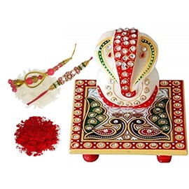 Purpledip Rakhi Hamper for Bhai-Bhabhi: Bhai Rakshabandhan Bracelet. Bhabhi Lumba Latkan, Roli Chawal Tika, Designer Marble Chowki Ganesha (rakhi1c)