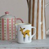 Creative Co-Op Stoneware Painted Deer, Multicolor Creamer, Ivory