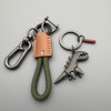 Aluminum Alloy Dinosaur Charm Paired with a Hand-woven Bracelet, Keychain