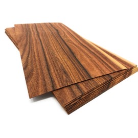 15-20 veneers in the wood type Santos rosewood, total quantity per set 0.7 m² precious veneer Suitable for: Craft repair works, photo gift, price labels, inlays.