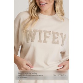 Six Stories Collegiate-Inspired Wifey Tee w/Soft Teddy Applique | Boxy Fit Shirt for Honeymoon Lounging in Champagne | Ideal Gift for Anniversary, Birthday, Bachelorette Party or Wedding | X-Small