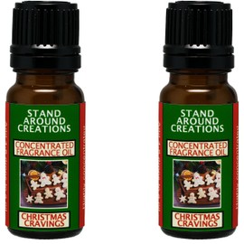 Set of 2- Concentrated Fragrance Oil - Christmas Cravings: Notes of orange w/apple, cinnamon, ginger, and nutmeg.Infused w/essential oils (.33 fl.oz.)