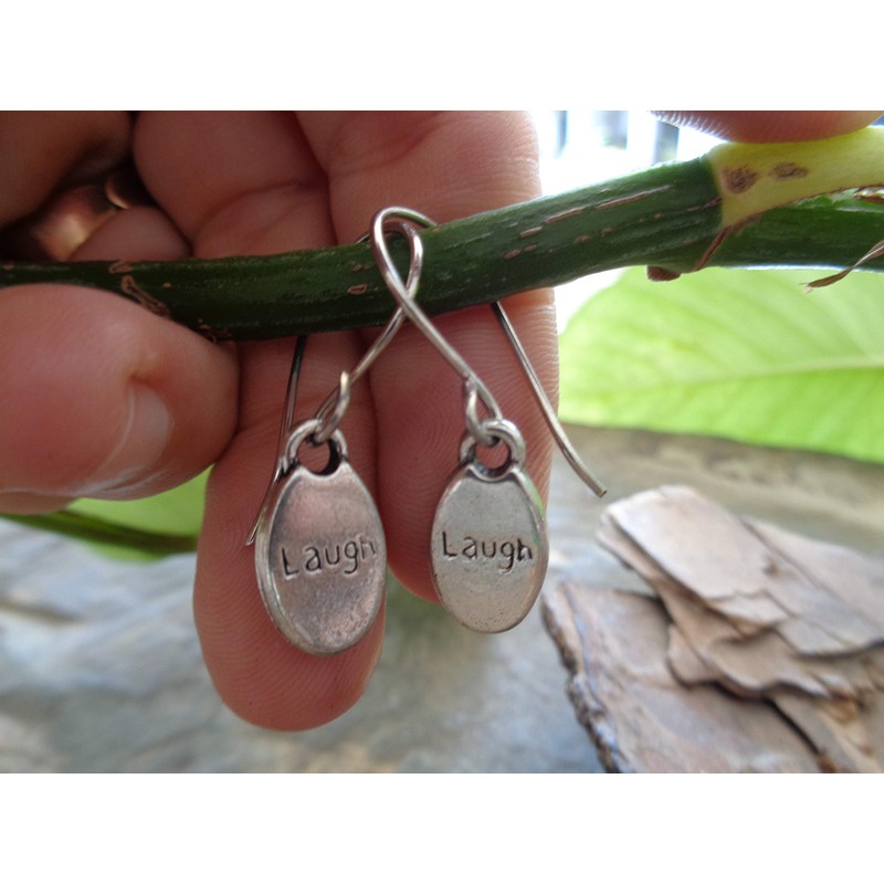 Laughing silver oval thick plates on long self-curved hooks