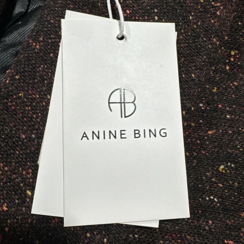 Anine Bing features double breasted closure with a cropped, boxy